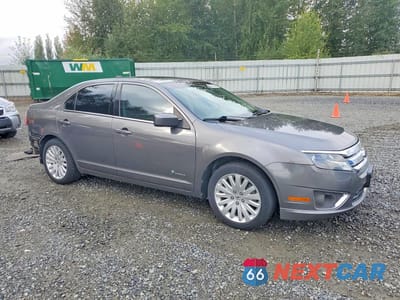 Czwarte zdjęcie samochodu z boku: 2010 FORD FUSION HYBRID VIN:3FADP0L36AR267959 - miniatura