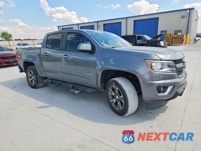 Czwarte zdjęcie samochodu z boku: 2019 CHEVROLET COLORADO Z71 VIN:1GCGTDEN3K1129736 - miniatura