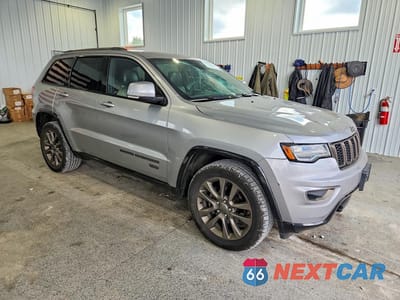 Czwarte zdjęcie samochodu z boku: 2016 JEEP GRAND CHEROKEE LIMITED VIN:1C4RJFBG5GC367390 - miniatura