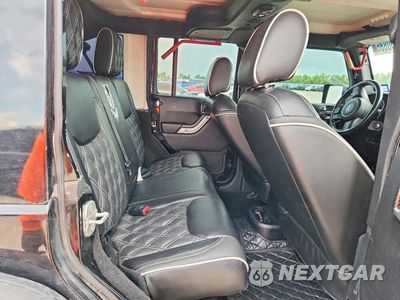 Zdjęcie 11 z 13 samochodu: 2015 JEEP WRANGLER UNLIMITED SAHARA VIN:1C4BJWEG9FL648605 - miniatura