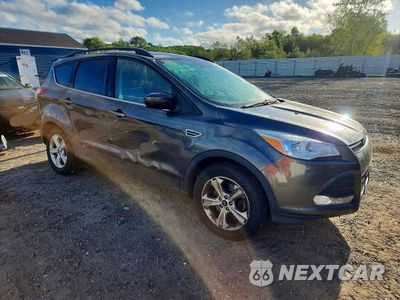 Czwarte zdjęcie samochodu z boku: 2016 FORD ESCAPE SE VIN:1FMCU9G94GUC84922 - miniatura