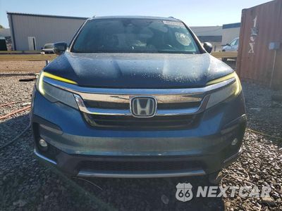 Piąte zdjęcie samochodu w środku: 2019 HONDA PILOT TOURING VIN:5FNYF6H66KB034929 - miniatura