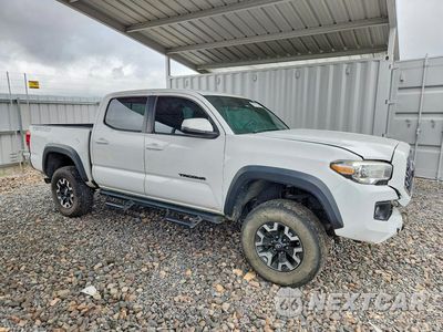 Czwarte zdjęcie samochodu z boku: 2019 TOYOTA TACOMA TRD OFF-ROAD VIN:3TMCZ5AN8KM194836 - miniatura