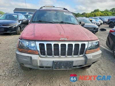 Piąte zdjęcie samochodu w środku: 1999 JEEP GRAND CHEROKEE LAREDO VIN:1J4GW58S7XC678876 - miniatura