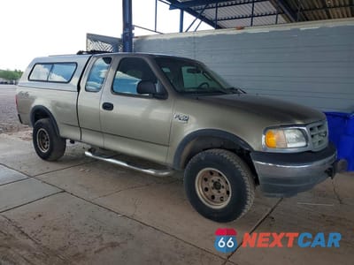Czwarte zdjęcie samochodu z boku: 2002 FORD F150 VIN:1FTRX18W02NB83486 - miniatura