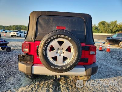 Zdjęcie 6 z 12 samochodu: 2010 JEEP WRANGLER UNLIMITED SAHARA VIN:1J4BB5H17AL177815 - miniatura