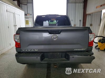 Zdjęcie 6 z 13 samochodu: 2018 NISSAN TITAN PRO-4X VIN:1N6AA1E5XJN514242 - miniatura