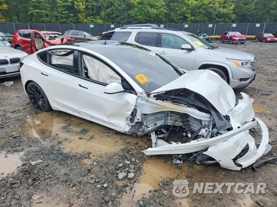 Czwarte zdjęcie samochodu z boku: 2022 TESLA MODEL 3 VIN:5YJ3E1EC0NF110479 - miniatura