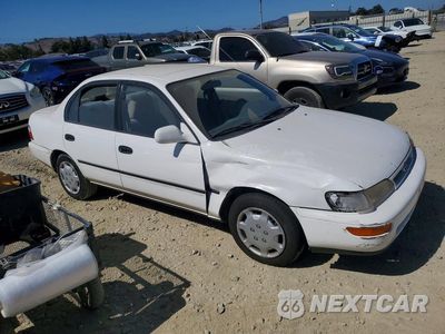 Czwarte zdjęcie samochodu z boku: 1997 TOYOTA COROLLA DX VIN:1NXBB02E9VZ659086 - miniatura