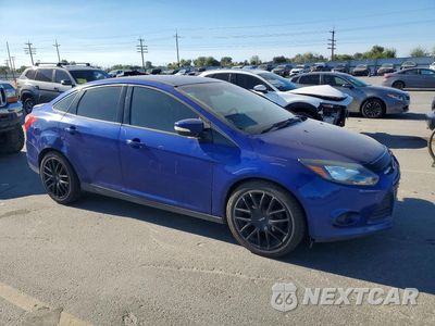 Czwarte zdjęcie samochodu z boku: 2012 FORD FOCUS SE VIN:1FAHP3F25CL267684 - miniatura