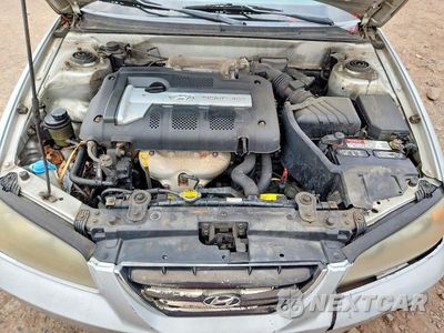 Zdjęcie 11 z 12 samochodu: 2004 HYUNDAI ELANTRA GLS VIN:KMHDN46D44U916260 - miniatura