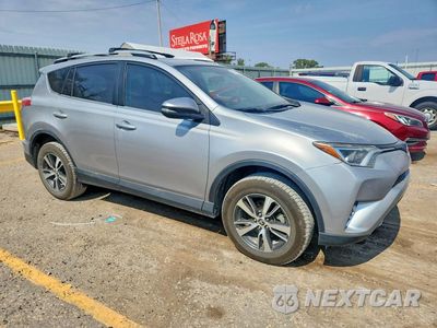 Czwarte zdjęcie samochodu z boku: 2016 TOYOTA RAV4 XLE VIN:2T3WFREVXGW276998 - miniatura