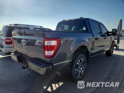 Trzecie zdjęcie samochodu z tyłu: 2023 FORD F150 SUPERCREW VIN:1FTFW1E51PKF71272 - miniatura