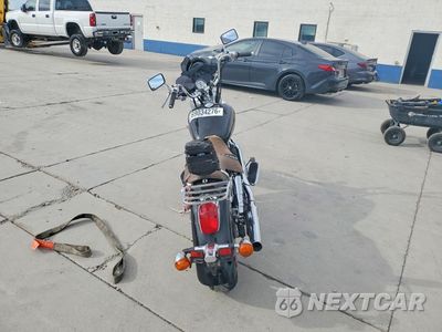 Czwarte zdjęcie samochodu z boku: 2003 HONDA VT1100 VIN:1HFSC43073A302117 - miniatura