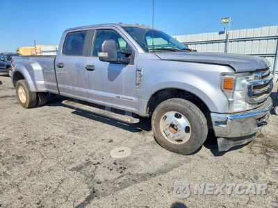 Czwarte zdjęcie samochodu z boku: 2022 FORD F350 SUPER DUTY VIN:1FT8W3CT4NEE76917 - miniatura