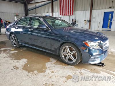 Czwarte zdjęcie samochodu z boku: 2017 MERCEDES-BENZ E 300 4MATIC VIN:WDDZF4KB9HA067431 - miniatura