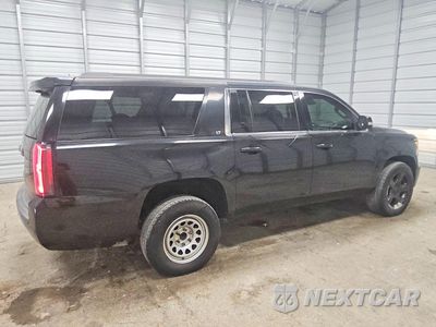 Trzecie zdjęcie samochodu z tyłu: 2016 CHEVROLET SUBURBAN C1500 LT VIN:1GNSCHKC0GR111778 - miniatura