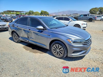 Czwarte zdjęcie samochodu z boku: 2019 VOLKSWAGEN JETTA SEL VIN:3VWE57BU2KM062481 - miniatura