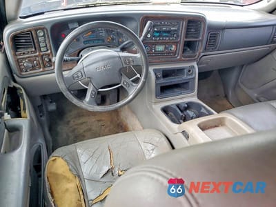Zdjęcie 8 z 14 samochodu: 2003 GMC YUKON XL K1500 VIN:1GKFK16Z83J104626 - miniatura