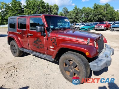 Czwarte zdjęcie samochodu z boku: 2009 JEEP WRANGLER UNLIMITED SAHARA VIN:1J8GA59179L758023 - miniatura