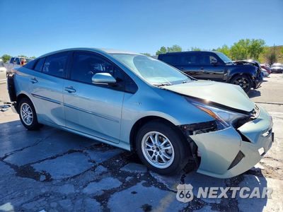 Czwarte zdjęcie samochodu z boku: 2016 TOYOTA PRIUS TWO VIN:JTDKBRFU8G3509571 - miniatura