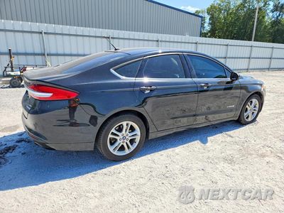 Trzecie zdjęcie samochodu z tyłu: 2018 FORD FUSION SE HYBRID VIN:3FA6P0LU9JR274275 - miniatura