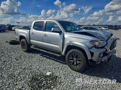 Czwarte zdjęcie samochodu z boku: 2023 TOYOTA TACOMA SR5 V6 VIN:3TYCZ5AN5PT113092 - miniatura