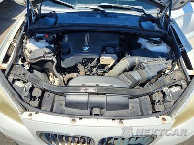 Zdjęcie 12 z 14 samochodu: 2014 BMW X1 SDRIVE28I VIN:WBAVM1C59EVW48919 - miniatura
