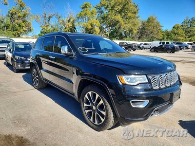 Czwarte zdjęcie samochodu z boku: 2018 JEEP GRAND CHEROKEE OVERLAND VIN:1C4RJFCG5JC240127 - miniatura