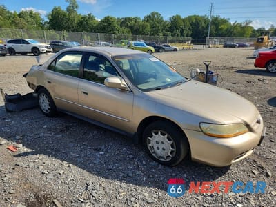 Czwarte zdjęcie samochodu z boku: 2001 HONDA ACCORD LX VIN:1HGCG56471A138390 - miniatura