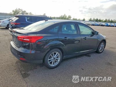 Trzecie zdjęcie samochodu z tyłu: 2015 FORD FOCUS SE VIN:1FADP3F22FL319677 - miniatura