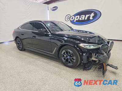 Czwarte zdjęcie samochodu z boku: 2024 BMW I4 EDRIVE 35 VIN:WBY43AW01RFS85435 - miniatura