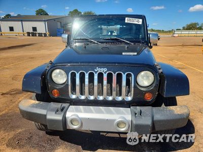Piąte zdjęcie samochodu w środku: 2009 JEEP WRANGLER UNLIMITED SAHARA VIN:1J4GA59159L772763 - miniatura