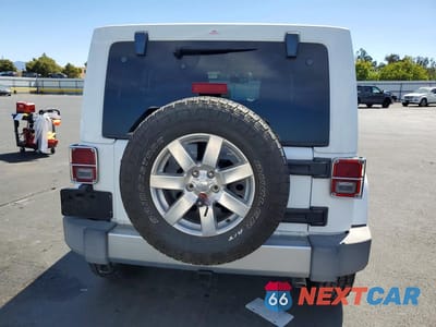 Zdjęcie 6 z 13 samochodu: 2013 JEEP WRANGLER UNLIMITED SAHARA VIN:1C4BJWEG0DL647257 - miniatura