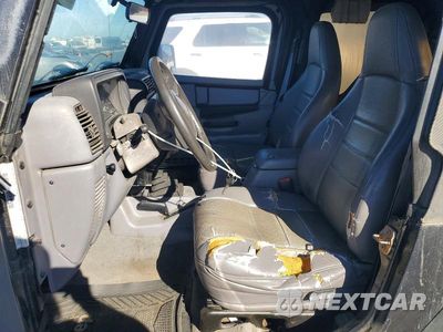 Zdjęcie 7 z 12 samochodu: 1997 JEEP WRANGLER / TJ SPORT VIN:1J4FY19S1VP520424 - miniatura