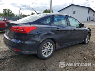 Trzecie zdjęcie samochodu z tyłu: 2018 FORD FOCUS SE VIN:1FADP3F27JL306545 - miniatura