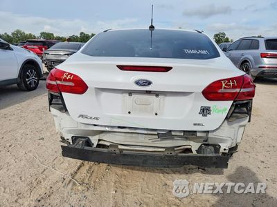 Zdjęcie 6 z 13 samochodu: 2017 FORD FOCUS SEL VIN:1FADP3H29HL269330 - miniatura