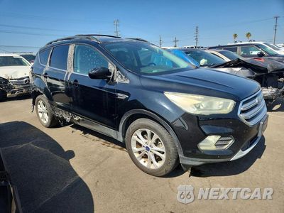 Czwarte zdjęcie samochodu z boku: 2017 FORD ESCAPE SE VIN:1FMCU0GD9HUA95068 - miniatura