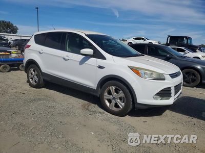 Czwarte zdjęcie samochodu z boku: 2014 FORD ESCAPE SE VIN:1FMCU0GX9EUE42016 - miniatura