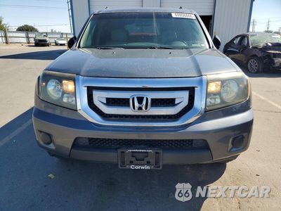 Piąte zdjęcie samochodu w środku: 2010 HONDA PILOT LX VIN:5FNYF4H20AB011288 - miniatura