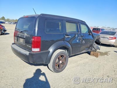 Trzecie zdjęcie samochodu z tyłu: 2010 DODGE NITRO SE VIN:1D4PT2GK3AW126069 - miniatura