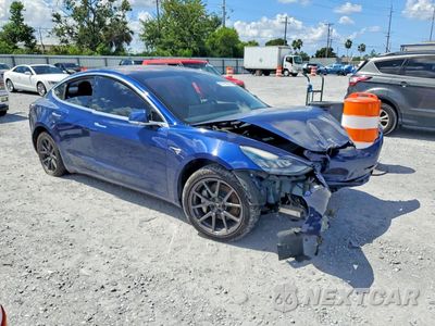 Czwarte zdjęcie samochodu z boku: 2018 TESLA MODEL 3 VIN:5YJ3E1EA0JF026106 - miniatura