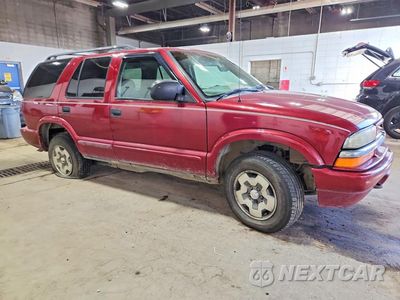 Czwarte zdjęcie samochodu z boku: 2003 CHEVROLET BLAZER VIN:1GNDT13XX3K137227 - miniatura