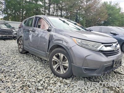 Czwarte zdjęcie samochodu z boku: 2018 HONDA CR-V LX VIN:2HKRW6H34JH210984 - miniatura