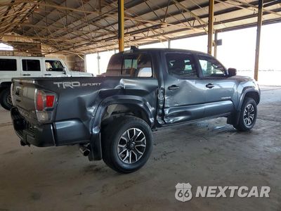 Trzecie zdjęcie samochodu z tyłu: 2022 TOYOTA TACOMA TRD SPORT VIN:3TMAZ5CN3NM164684 - miniatura