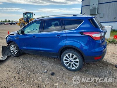 Drugie zdjęcie samochodu z przodu: 2017 FORD ESCAPE TITANIUM VIN:1FMCU9J92HUB80973 - miniatura
