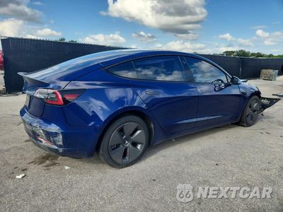 Trzecie zdjęcie samochodu z tyłu: 2022 TESLA MODEL 3 VIN:5YJ3E1EA8NF337224 - miniatura