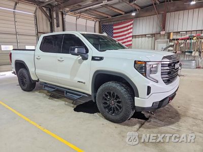 Czwarte zdjęcie samochodu z boku: 2022 GMC SIERRA K1500 AT4 VIN:1GTUUEET4NZ521974 - miniatura