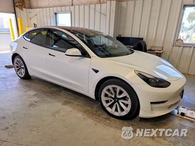 Czwarte zdjęcie samochodu z boku: 2022 TESLA MODEL 3 VIN:5YJ3E1EA9NF190525 - miniatura