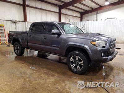 Czwarte zdjęcie samochodu z boku: 2016 TOYOTA TACOMA TRD SPORT VIN:5TFDZ5BN7GX012189 - miniatura
